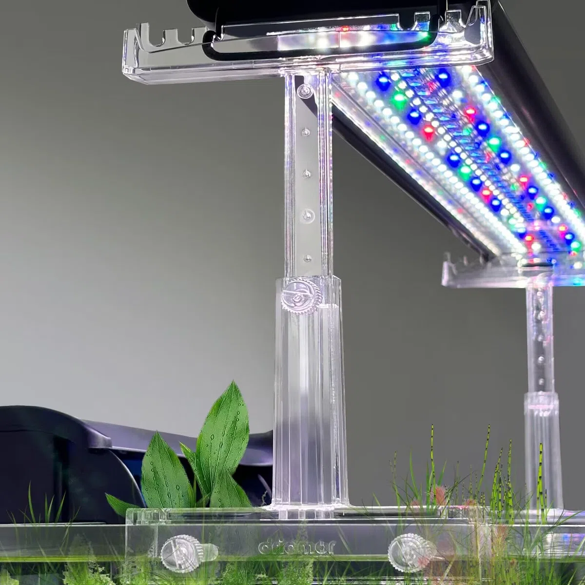Driamor Soporte de luz acuático ajustable, acrílico transparente para pecera, elevador de luz LED, kit de 2 soportes transparentes para ancho de 2.34 a 4.7 pulgadas
